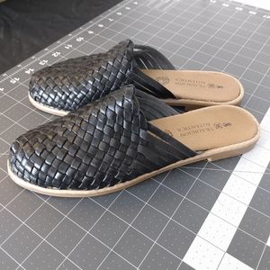 Black leather woven mules